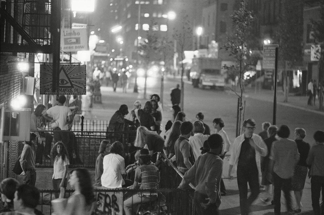 "The main stem of the East Village at St. Mark's Place, where hippies gather to 'do their own thing'" reads the caption, from 1968.